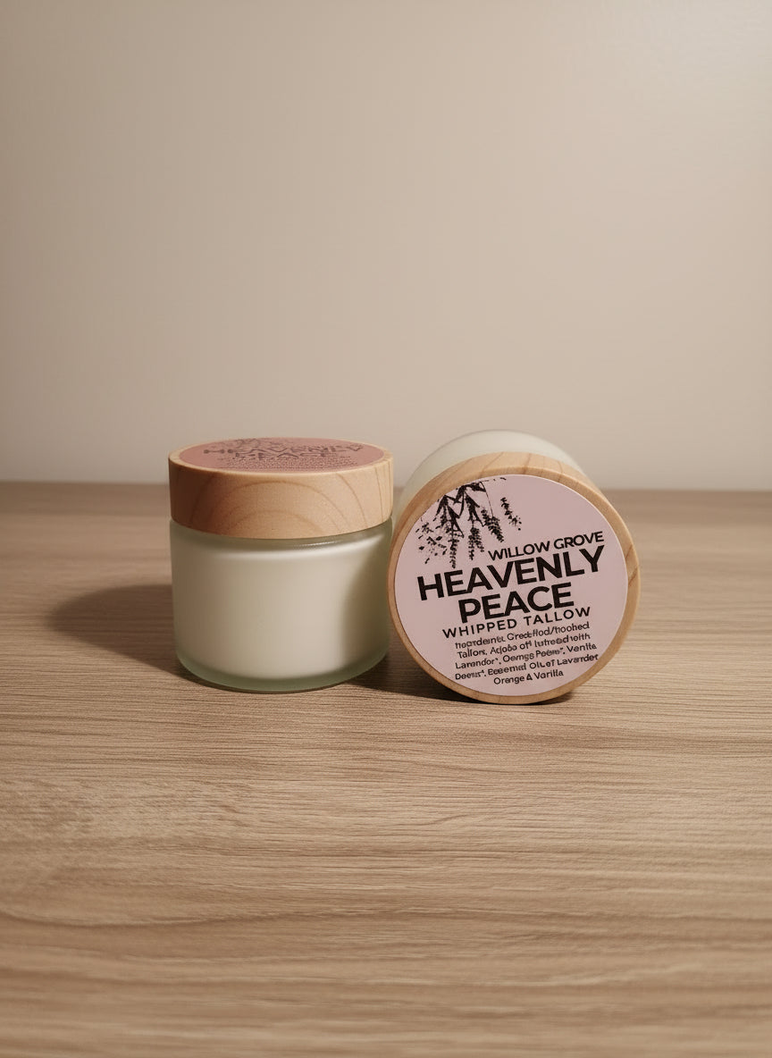 Jar of 'Heavenly Peace' whipped tallow on a wooden surface with a beige background