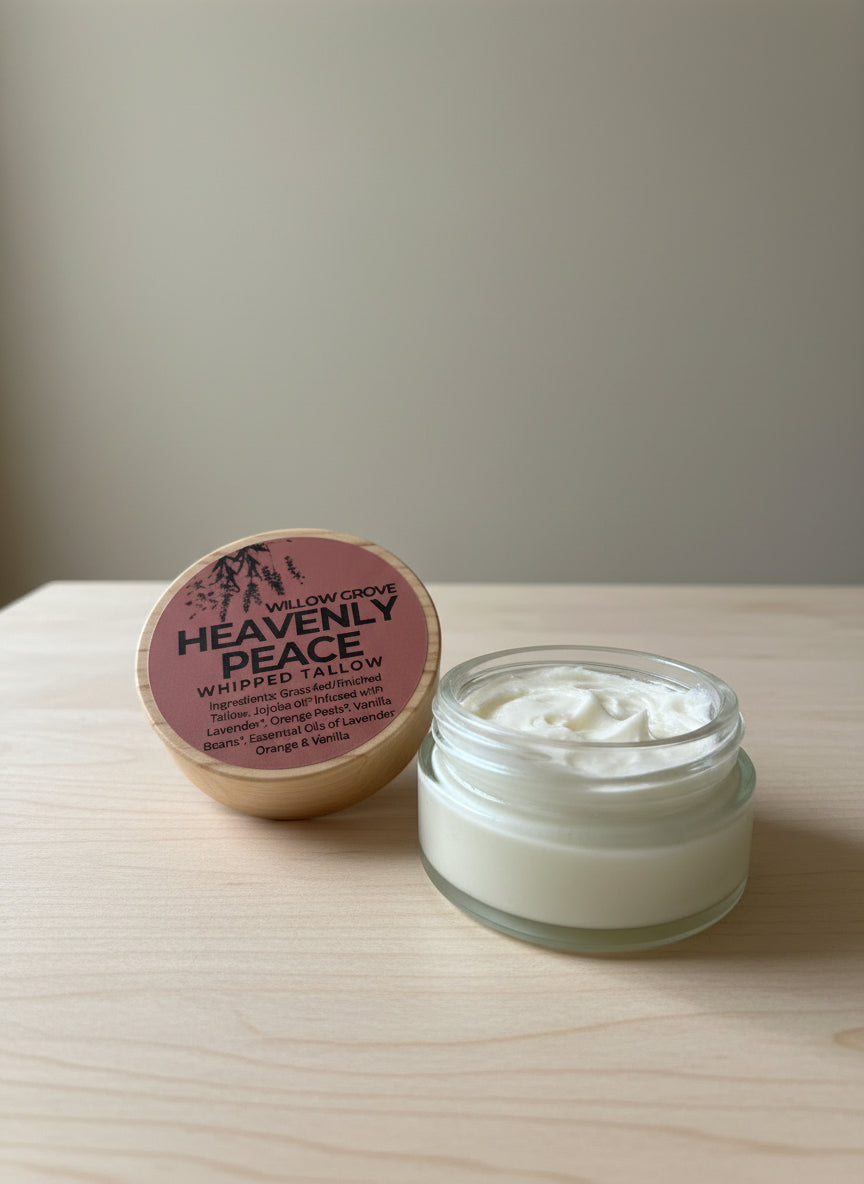 Jar of tallow with a pink lid on a wooden surface